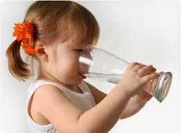 Small girl drinking water